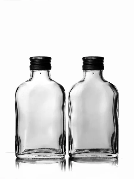 Two Empty Glass Russian Vodka Bottle Black Cap Isolated White — Stock Photo, Image