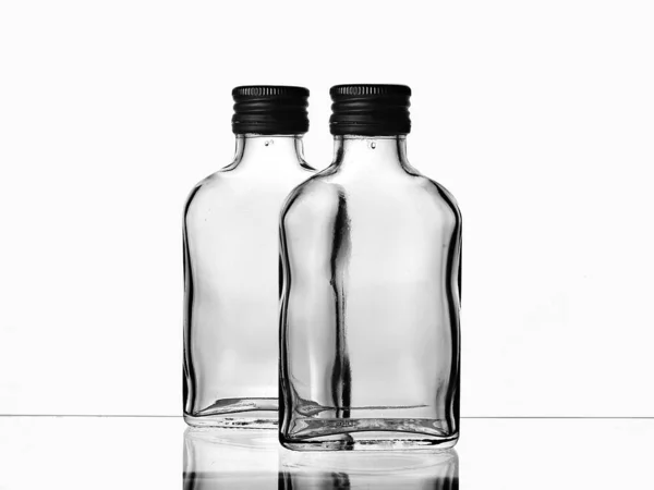 Two Empty Glass Russian Vodka Bottle Black Cap Isolated White — Stock Photo, Image