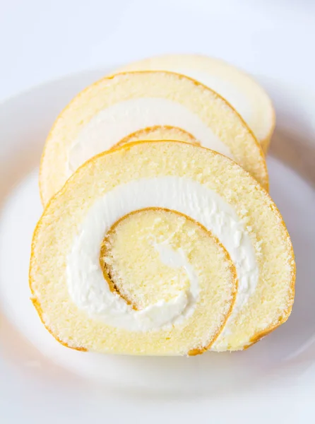 Swiss roll on white background. — Stock Photo, Image