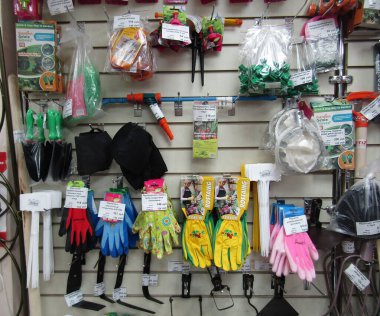 Russia, Chelyabinsk, March 2020: in the store Fertility for gardeners, garden tools and seeds on the shelves. Seasonal sales, the beginning of the garden and summer season.