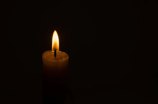 Glowing Candle Dark Burning Wick Candles Black Background Copy Space — Stock Photo, Image