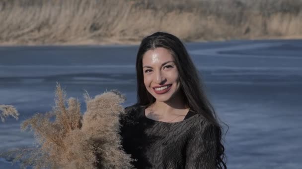 Young Caucasian Girl Black Dress Holds Cane Bouquet Her Hands — Stock Video