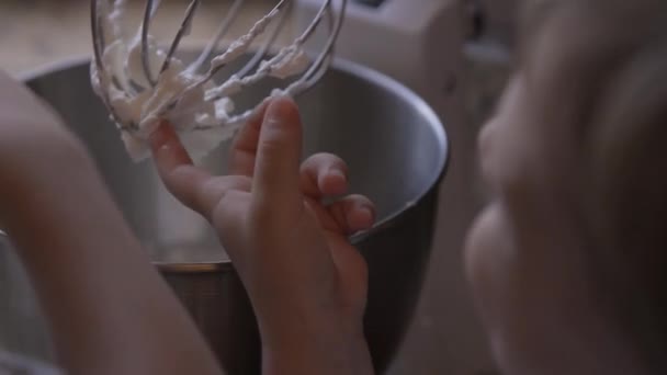 Two Children Fingers Take White Cream Mixer Put Mouth View — Stock Video