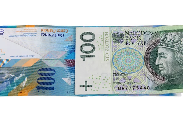 Banknotes of 100 PLN and swiss franc — Stock Photo, Image