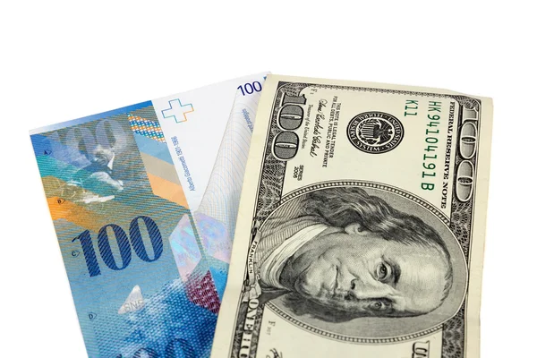 Sedlar av 100 Us dollar och schweiziska franc — Stockfoto