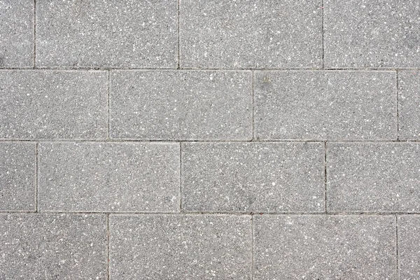 Sfondo fatto di grandi mattoni di cemento — Foto Stock
