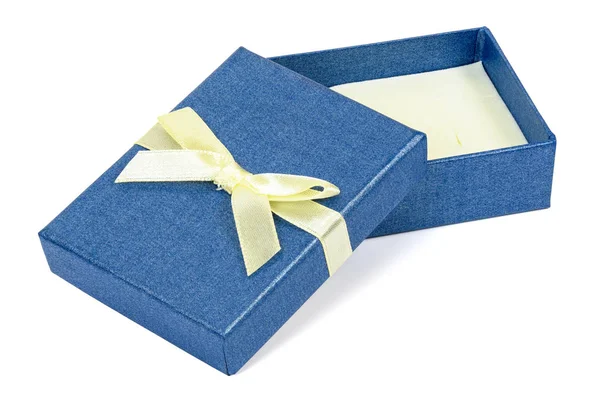 Blaue dekorative Geschenkschachtel mit gelber Schleife — Stockfoto