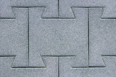 Koyu gri bir caddedeki kauçuk kaplamanın soyut arkaplan dokusu. zigzag