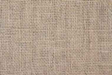 Arka plan için hafif doğal keten dokusu. Doğal pamuk, bej rengi.
