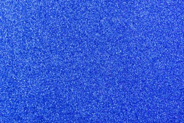 Foamirandan yapılmış doku arkaplan yüzeyi. Parıltı efektli parlak mavi köpüklü arka plan. Yıl Rengi 2020