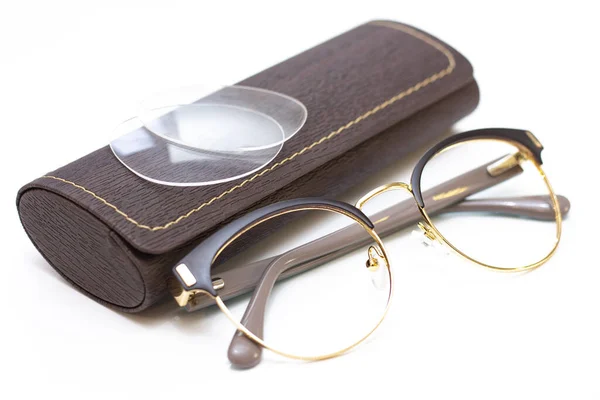 Modern Fashionable Womens Gold Glasses Sight Leather Case Light Background — Stock Photo, Image