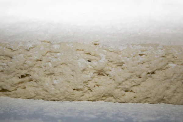 Closeup of raw dough with flour — Stock Photo, Image