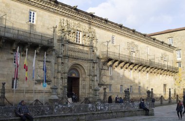 Santiago de Compostela,Spain. Facade of the Catholic Kings hostel in Obradoiro Square in Santiago de Compostela on December 6, 2019 clipart
