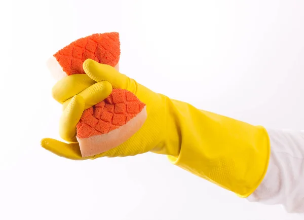 Ręka z rękawice wyciskanie gąbka — Zdjęcie stockowe