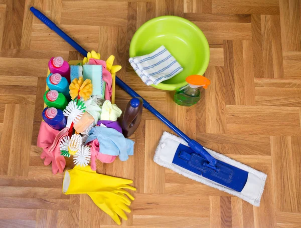 Cleaning supplies and equipment on floor — Stock Photo, Image