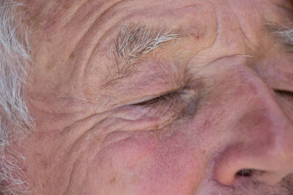 Old man's closed eyes — Stock Photo, Image