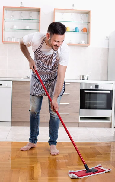 Man mopping floor — Stock Photo, Image