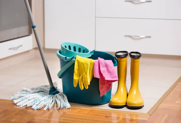 Cleaning equipment on kitchen floor — Stock Photo, Image