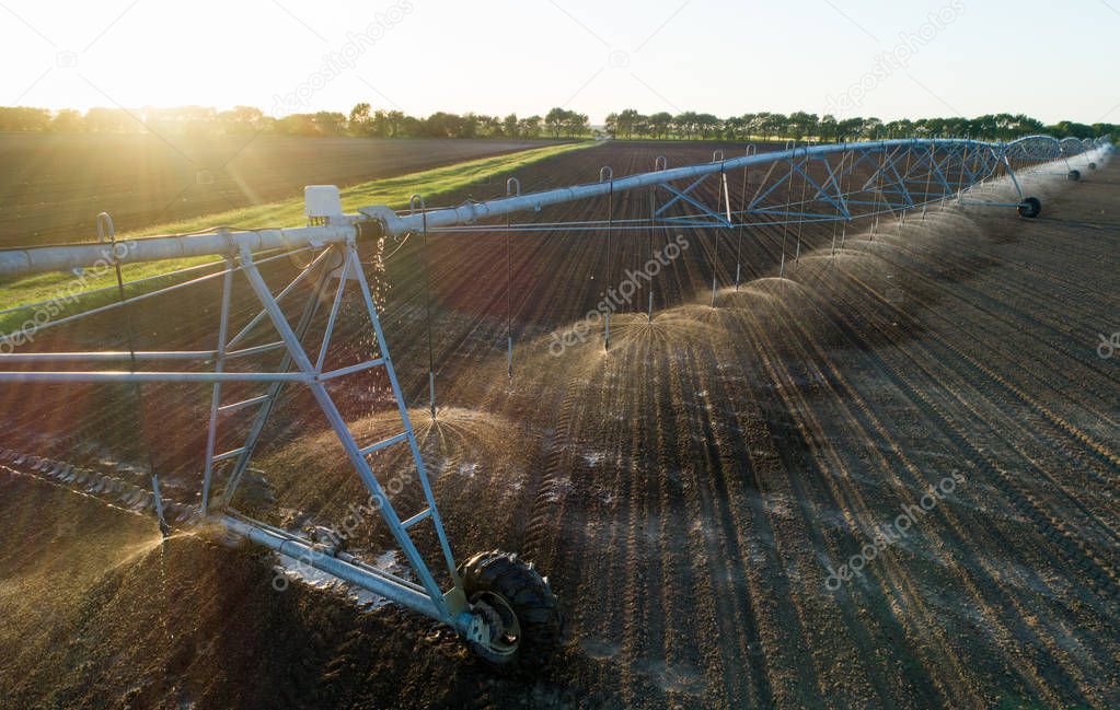 Center pivot irrigation system on field