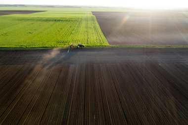 Aerial image of tractor working in field