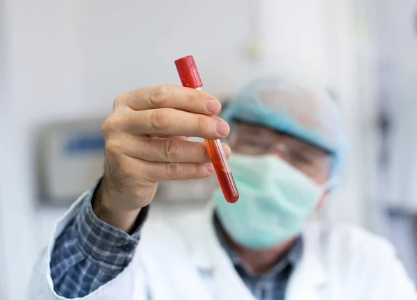 Close Researcher Hand Holding Test Tube Red Liquid Laboratory — стоковое фото