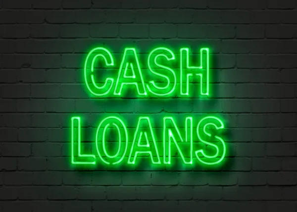 Empréstimos em dinheiro, sinal de néon na parede de tijolo — Fotografia de Stock