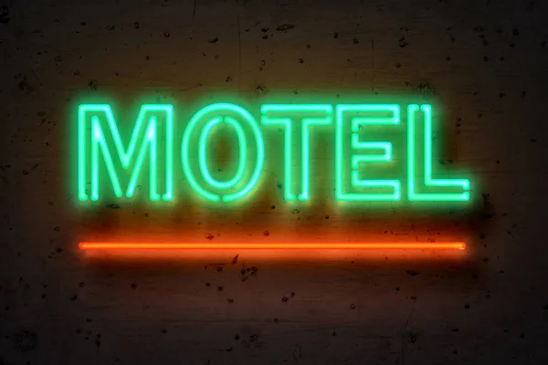 Motel, sinal de néon na parede de concreto — Fotografia de Stock