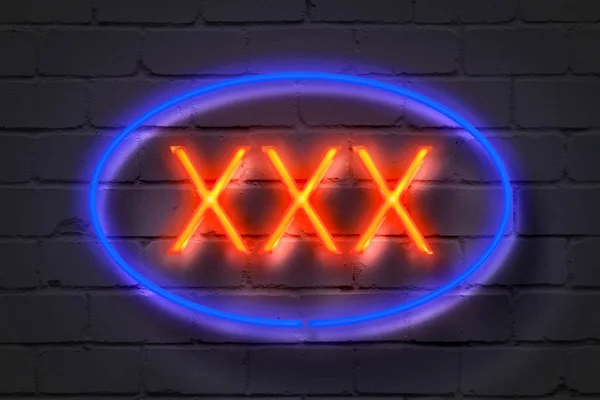 XXX, neon podepsat na cihlové zdi — Stock fotografie