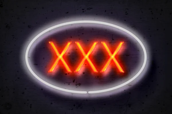 XXX, cartello al neon su muro di cemento — Foto Stock