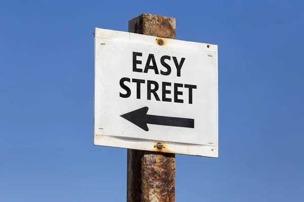 Palavra de rua fácil e poste de seta — Fotografia de Stock