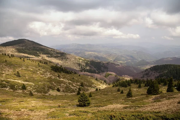 Spring landscape under clouds — Stock Photo, Image