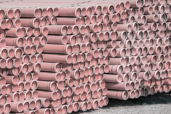 Stack of pvc pipes background — Stock Photo, Image