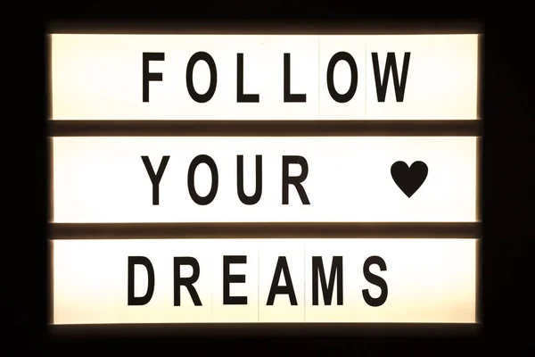 Follow your dreams hanging light box — Stock Photo, Image