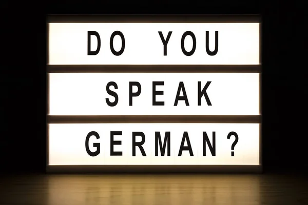 Parli tedesco scatola luminosa cartello — Foto Stock