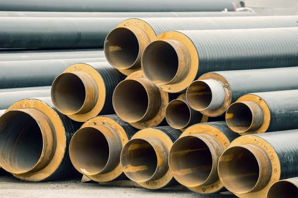 Staked insulated pipes for district heating — Stock Photo, Image