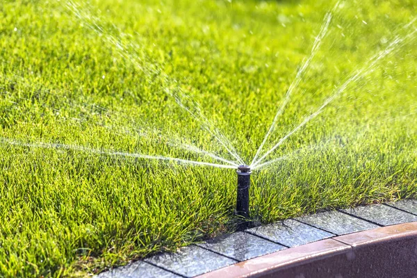 Underground sprinklersystem — Stockfoto