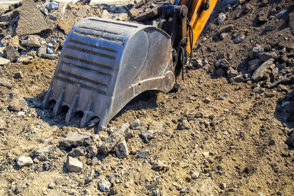 Excavator shovel removing construction waste recycling — Stock Photo, Image