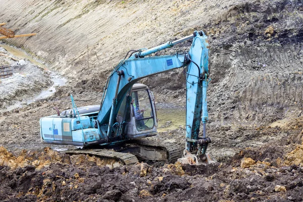 Grävfundament för blå grävmaskin — Stockfoto