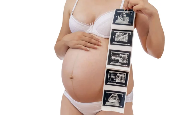 Zwangere vrouw in ondergoed met echografie foto — Stockfoto