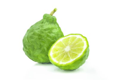 Fresh green bergamot fruit (Organic herbal natural) and half cut isolated on white background with clipping path.