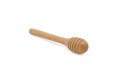 Close-up of Wooden honey dipper isolated on white background with clipping path.