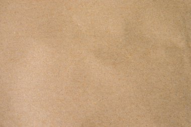 Kahverengi kağıt, el işi soyut arka plan. Retro, antika, eski, kağıt desenli sanat dokusu arka planı. Metin ve vignette etkisi için boş alan kopyasıyla deseni detaylandır.