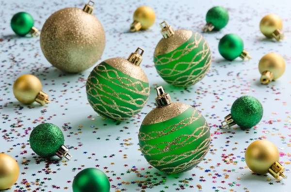 Green and gold christmas balls