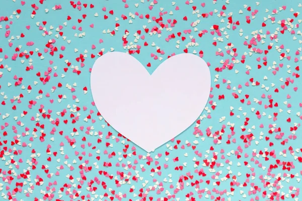 Bakgrund av färgglada hjärtan med papper hjärta för text — Stockfoto
