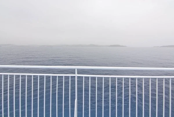 White railing and islands — Stock Photo, Image