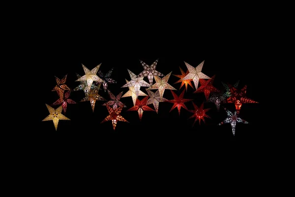 Kleurrijke papieren sterren geïsoleerd — Stockfoto