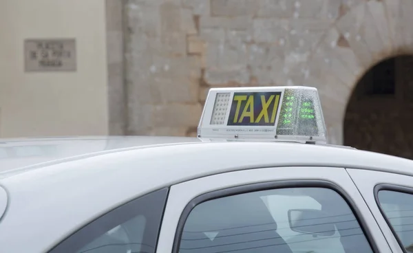 Taxi top old building in Majorca village — Stock Photo, Image