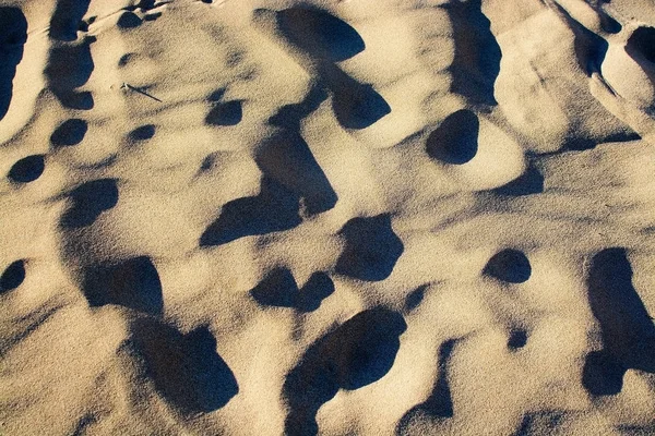 Praia padrão de areia closeup — Fotografia de Stock