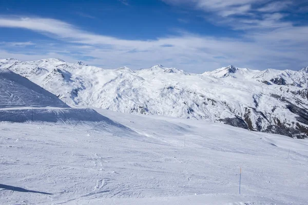 A wide piste, on a clear sunny day in Meribel, in the French Alps Royalty Free Stock Images