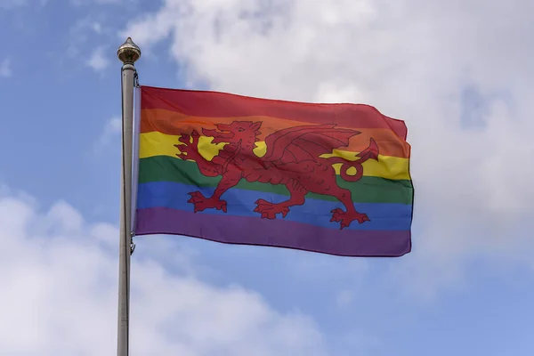 The Welsh flag, rainbow colored, to support the LGBTQ community. The Wales flag had a red dragon on it, and it supports Gay Pride